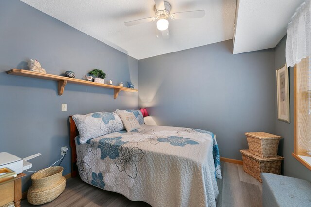 5650 Boone Ave N Unit 321, New Hope, MN 55428 - bedroom featuring wood finished floors and ceiling fan