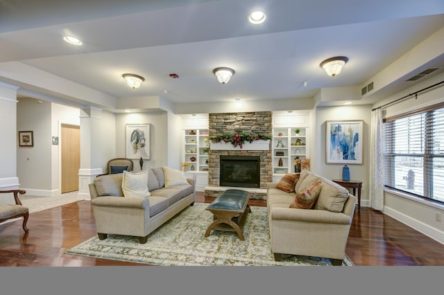 5650 Boone Ave N Unit 321, New Hope, MN 55428 - living room with wood finished floors, a stone fireplace, and recessed lighting