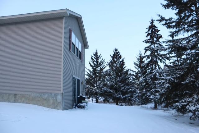 view of snow covered property