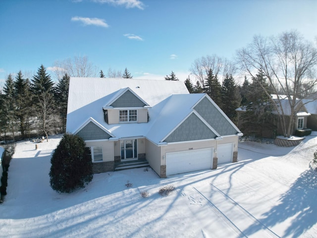 view of front of property featuring a garage