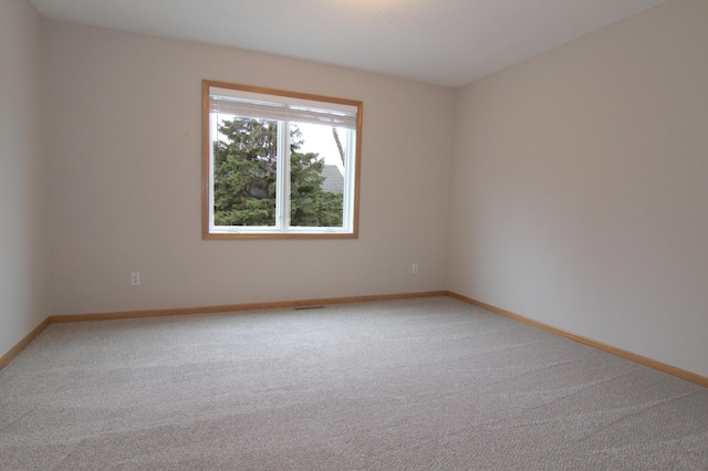 empty room with carpet floors