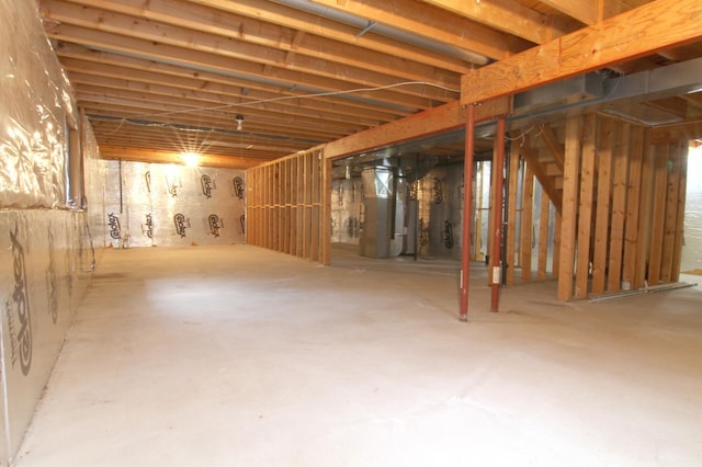 basement featuring heating unit