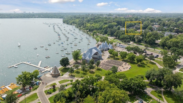 birds eye view of property with a water view