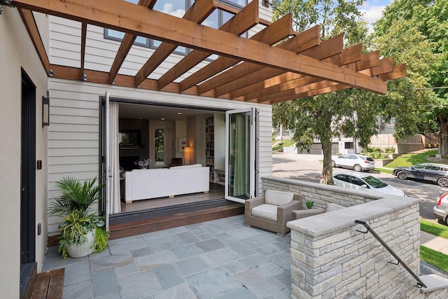 view of patio / terrace featuring a pergola