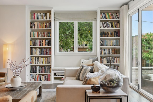 sitting room with hardwood / wood-style floors