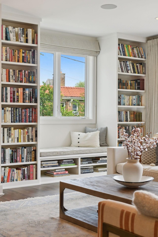 sitting room featuring wood-type flooring