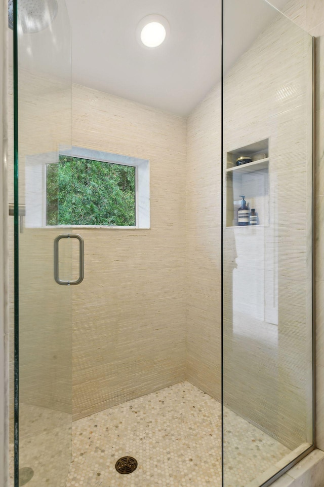 bathroom with an enclosed shower