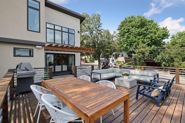 deck with area for grilling and an outdoor hangout area