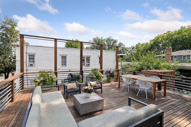 wooden terrace featuring an outdoor hangout area