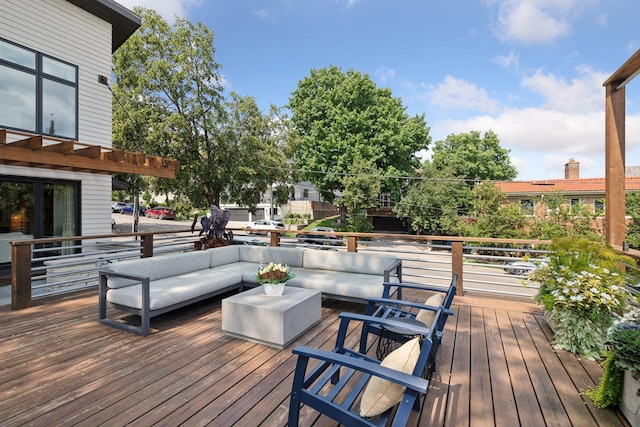 wooden terrace featuring outdoor lounge area