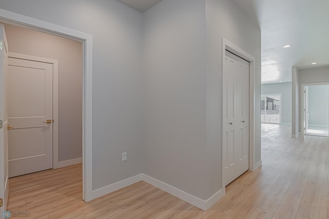 hallway featuring light hardwood / wood-style flooring