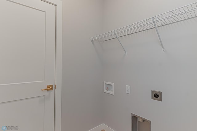 clothes washing area featuring electric dryer hookup and hookup for a washing machine