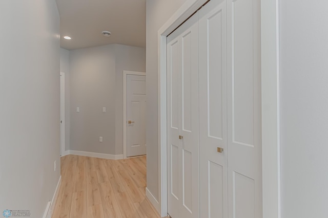 corridor featuring light hardwood / wood-style floors