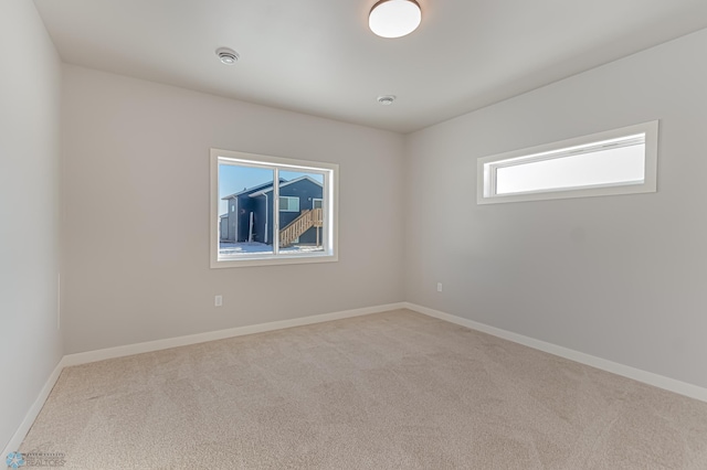 view of carpeted spare room