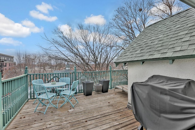 wooden deck featuring grilling area