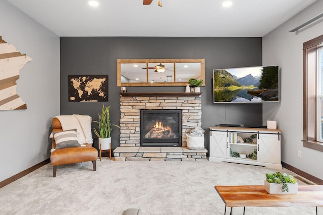 living room featuring recessed lighting, a fireplace, carpet flooring, baseboards, and ceiling fan