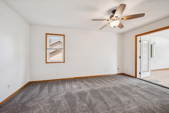 3876 Westbury Ln, Eagan, MN 55123 - carpeted empty room with a ceiling fan, baseboards, and a textured ceiling