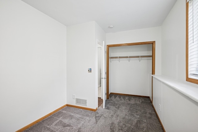3876 Westbury Ln, Eagan, MN 55123 - unfurnished bedroom featuring carpet floors, baseboards, and a closet