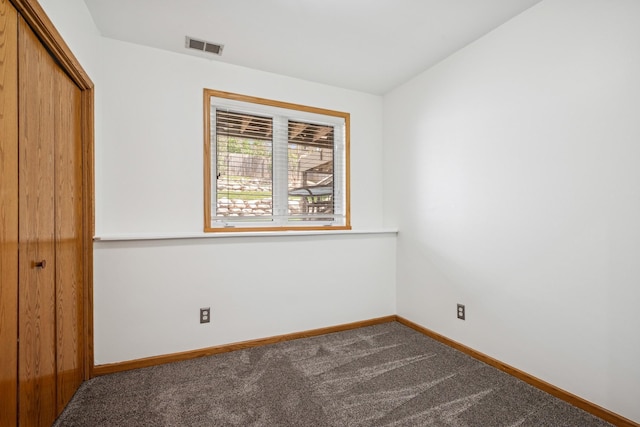 3876 Westbury Ln, Eagan, MN 55123 - unfurnished bedroom featuring a closet, carpet floors, and baseboards
