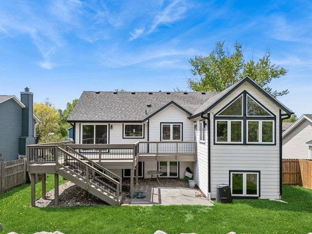 3876 Westbury Ln, Eagan, MN 55123 - back of house featuring stairs, a patio, a wooden deck, and a shingled roof