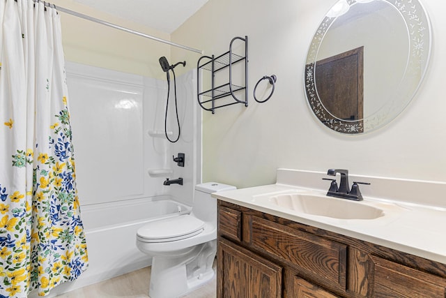 full bathroom with vanity, toilet, and shower / bath combo