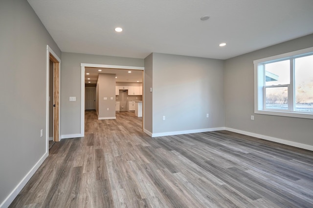 interior space with hardwood / wood-style flooring