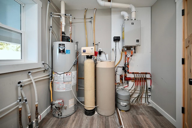 utilities with gas water heater and tankless water heater