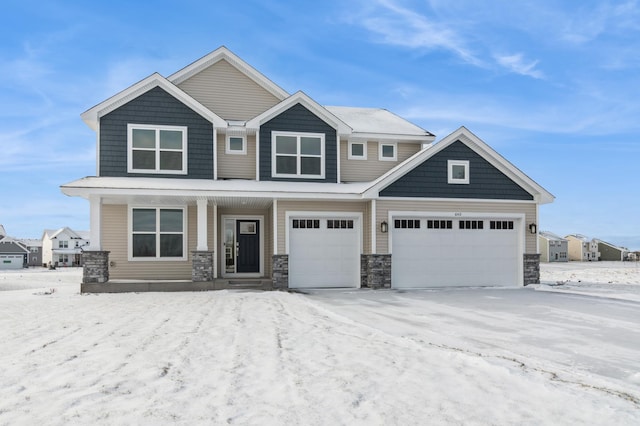 craftsman inspired home featuring a garage