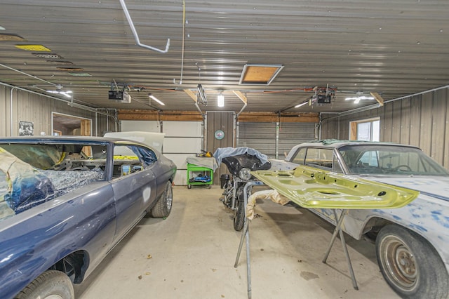 garage featuring a garage door opener