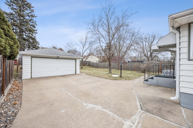 garage featuring a yard