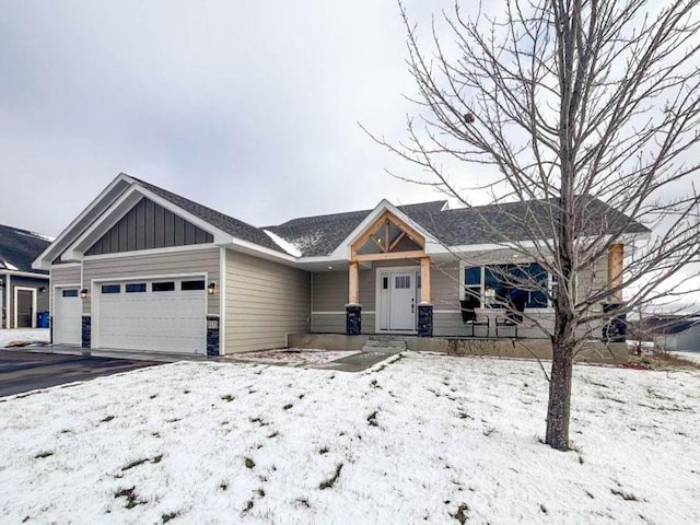 view of front of property with a garage