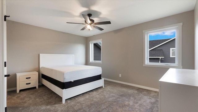 unfurnished bedroom featuring carpet flooring and ceiling fan