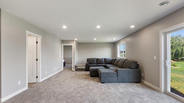 living room with light colored carpet