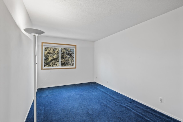 unfurnished room with carpet floors