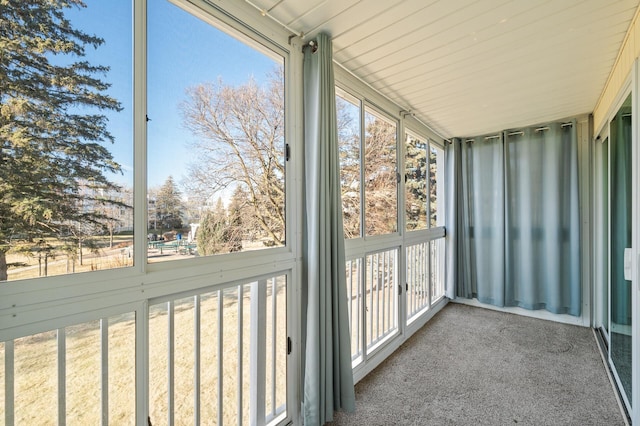 unfurnished sunroom featuring a healthy amount of sunlight