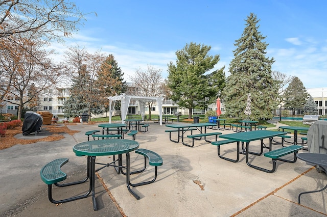 surrounding community with a pergola