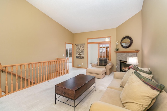 carpeted living room with lofted ceiling