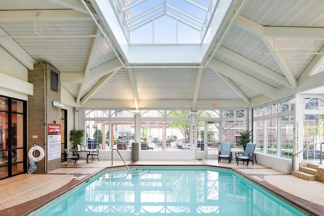 view of swimming pool with a skylight