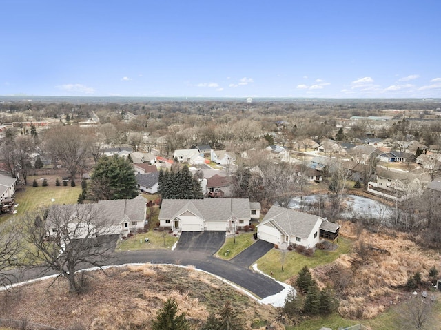 birds eye view of property with a residential view