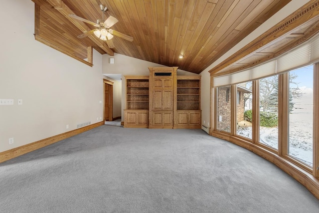 unfurnished living room featuring a wealth of natural light, carpet floors, and lofted ceiling