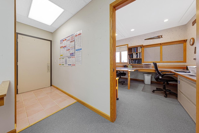 view of carpeted foyer entrance