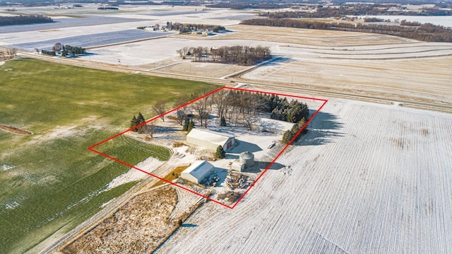 birds eye view of property featuring a rural view