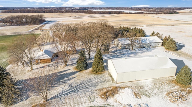 birds eye view of property with a rural view