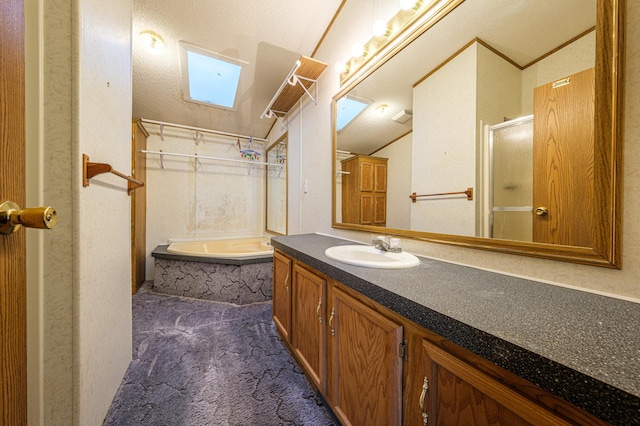 bathroom with vanity, lofted ceiling, and plus walk in shower