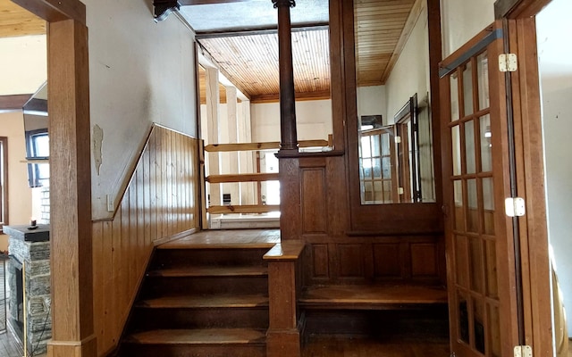 stairway with wooden walls