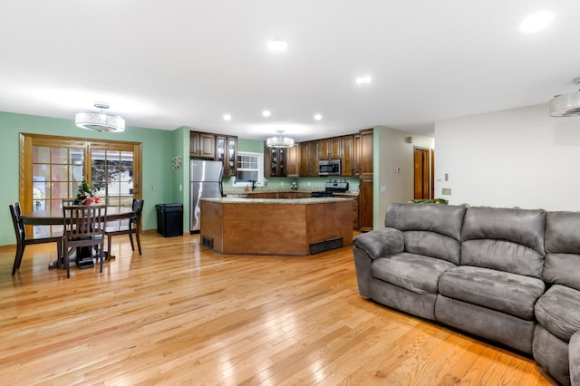 living room featuring light wood-type flooring