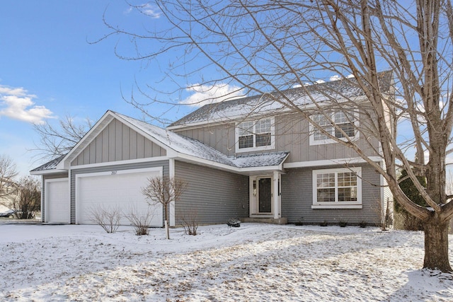 front facade with a garage