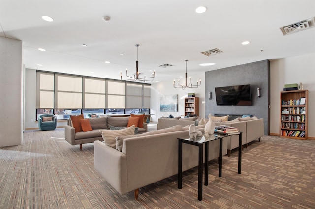 carpeted living room featuring an inviting chandelier