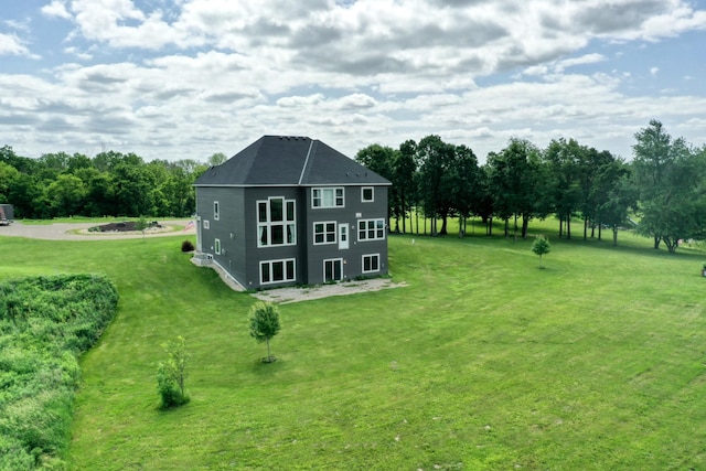 18340 Forest Rd N, Forest Lake, MN 55025 - view of side of home with a yard and view of wooded area
