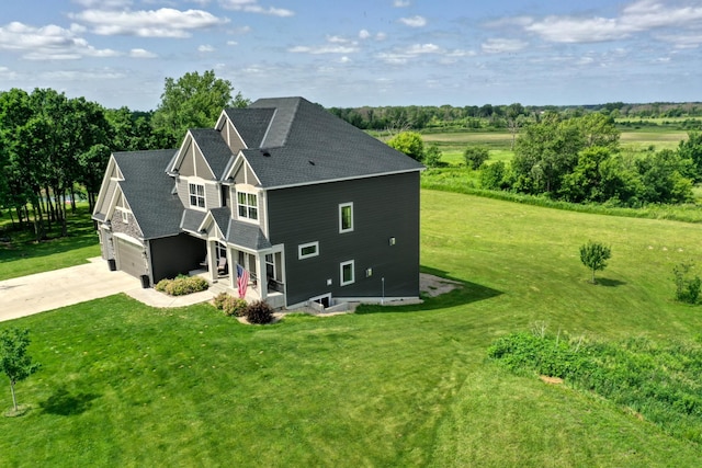 18340 Forest Rd N, Forest Lake, MN 55025 - view of property exterior with a garage, driveway, a yard, and a shingled roof